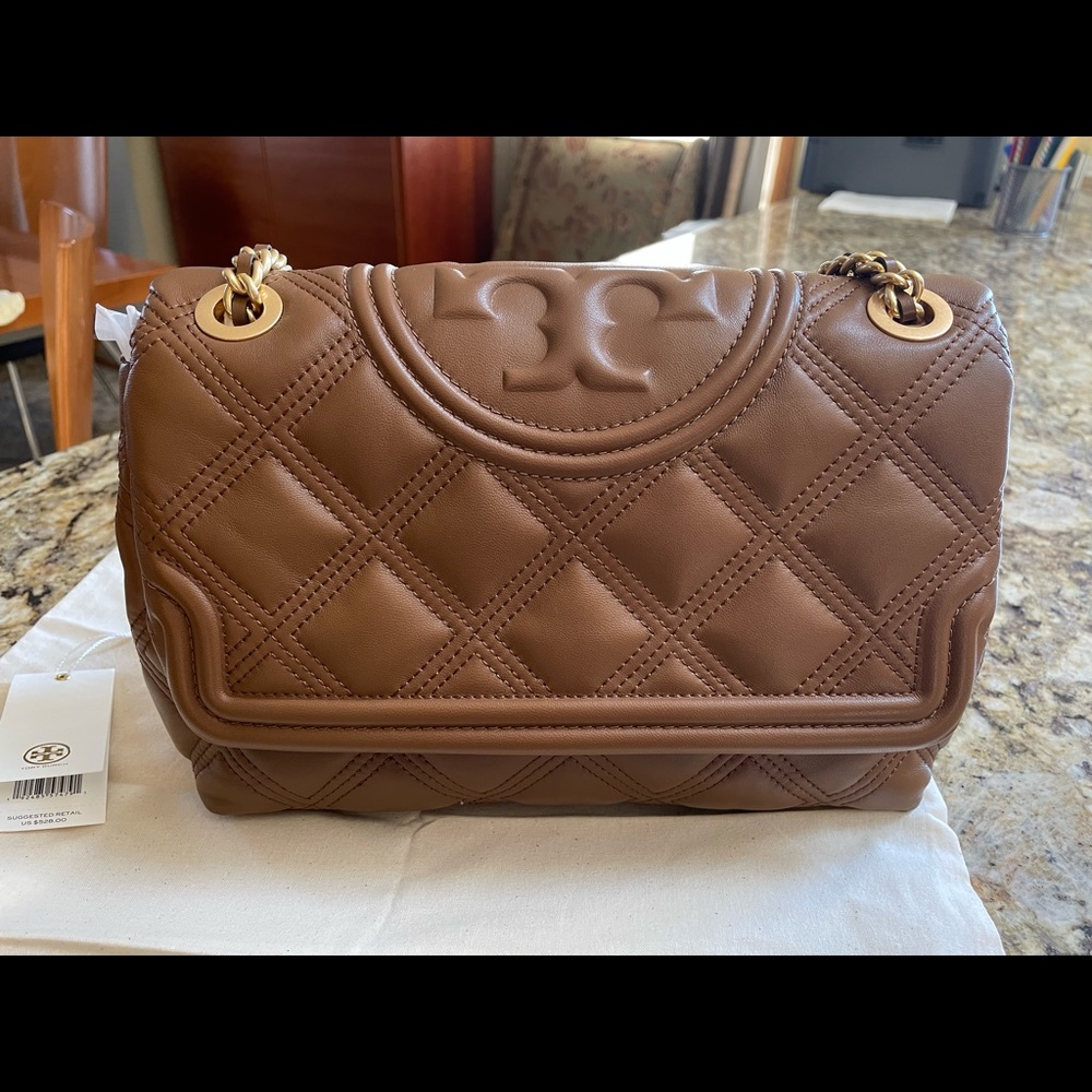 Brand new Tory Burch never worn